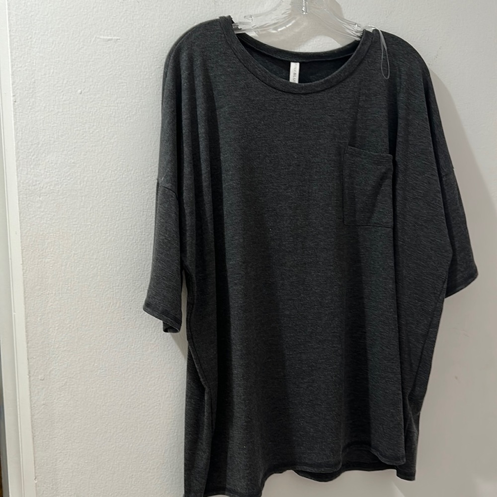 Pink blush shirt sleeve pocketed top
